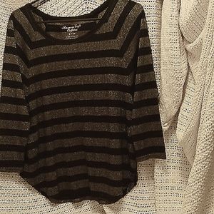 All right we have an American Eagle Outfitters small 3/4 light sleeve nylon poly